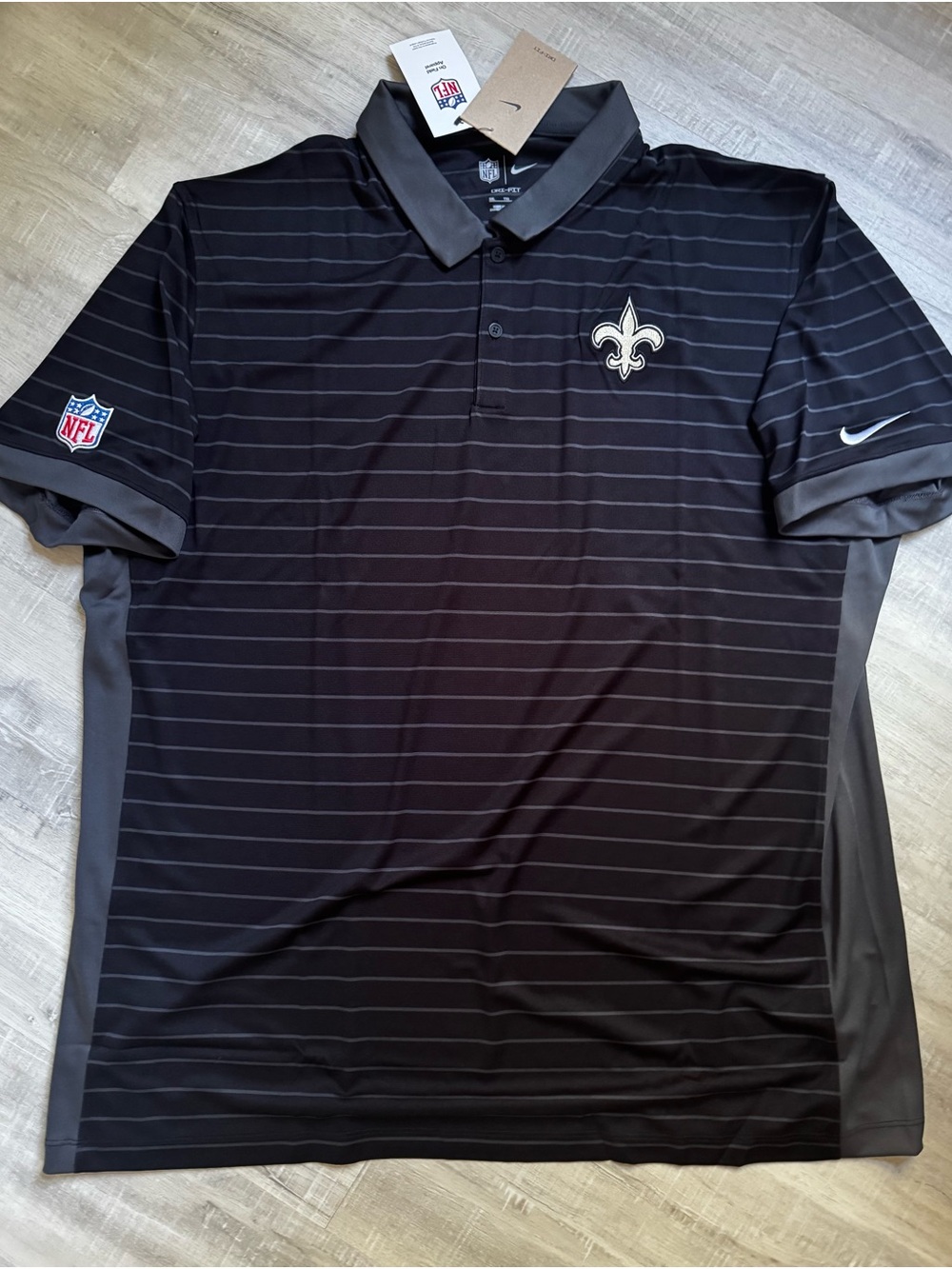 Nike Black New Orleans Saints Striped Polo